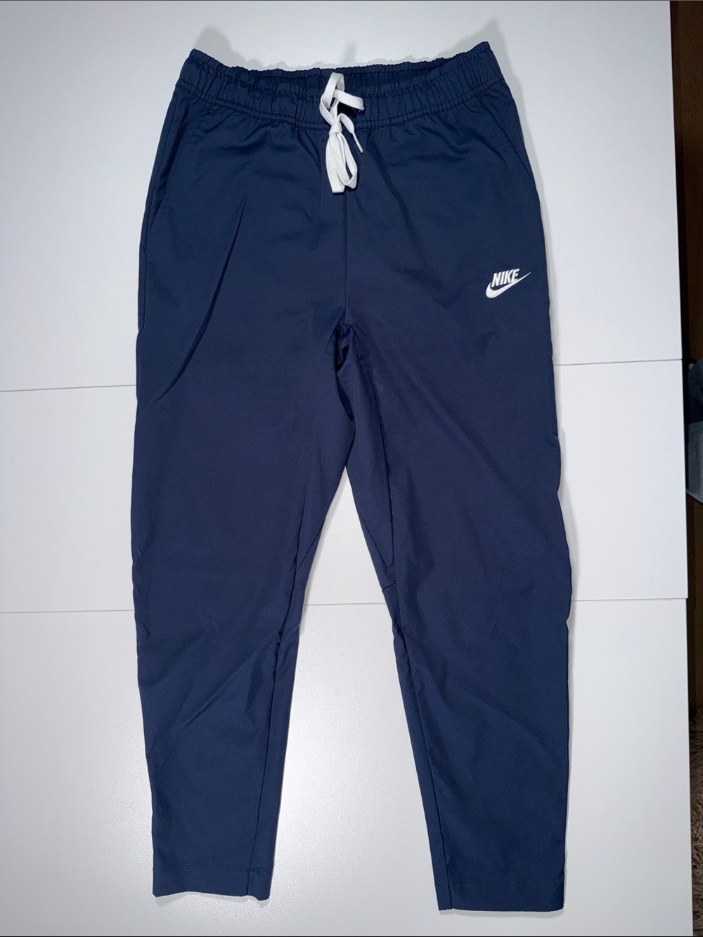 Nike Blue Track Pants with White Swoosh